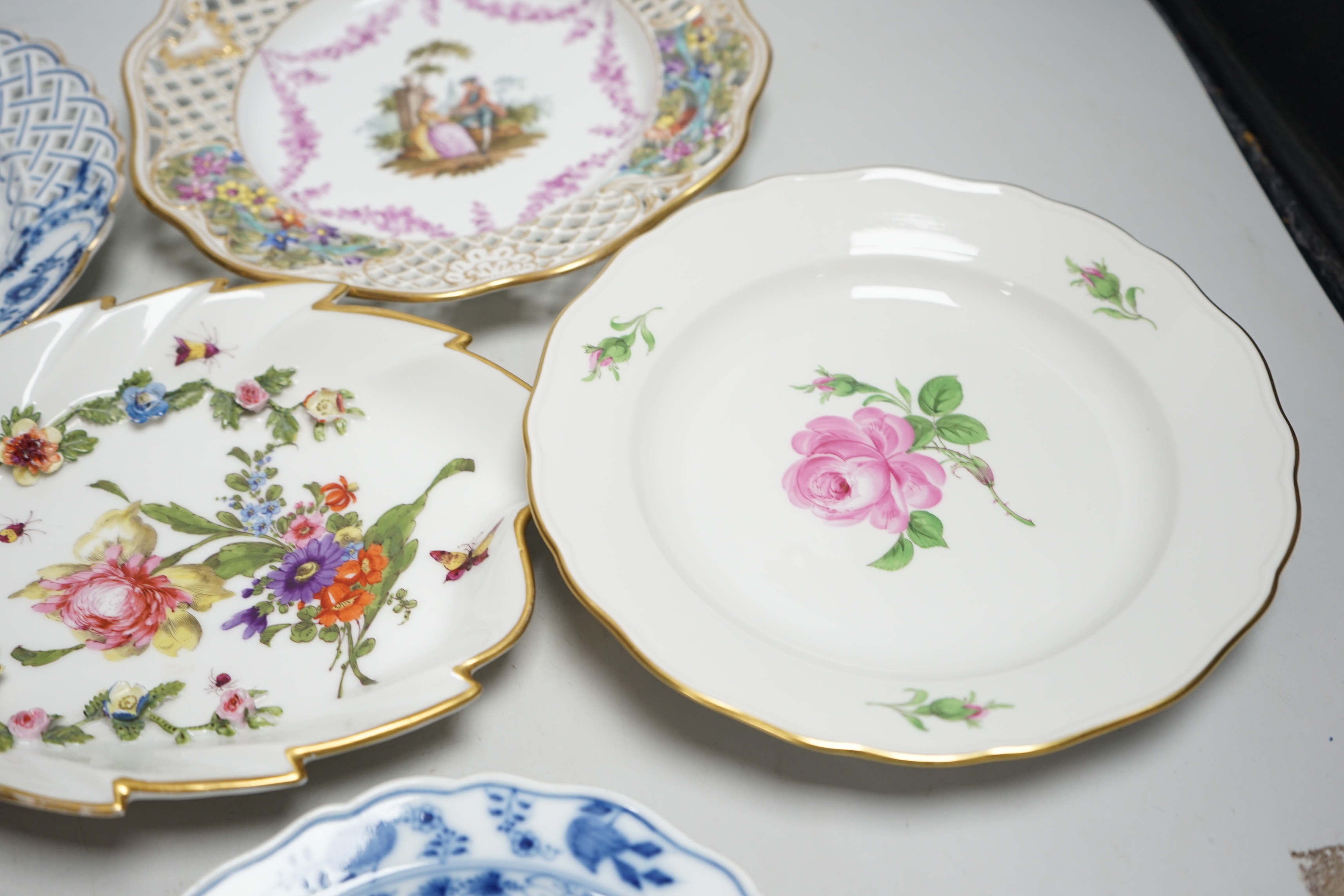 Six Continental plates by Meissen, Dresden, Sevres, etc. including Sevres Comtesse Dubarry portrait, two Meissen plates with pierced edges, two outside decorated, widest 23.5cm